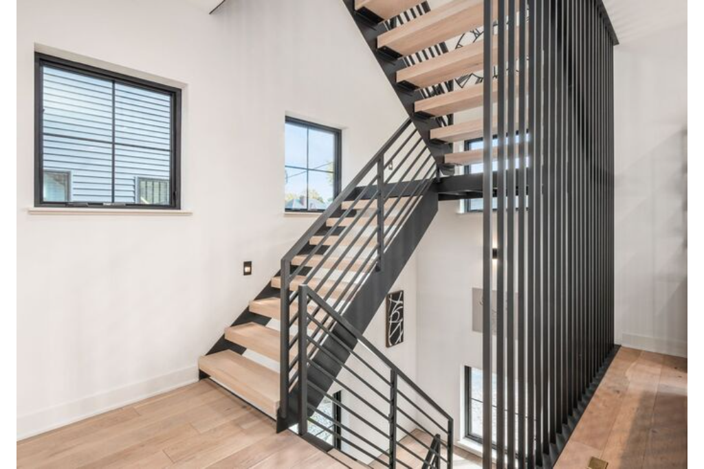 Stairs Leading Up To The Main Floor and Down To The Lower Level